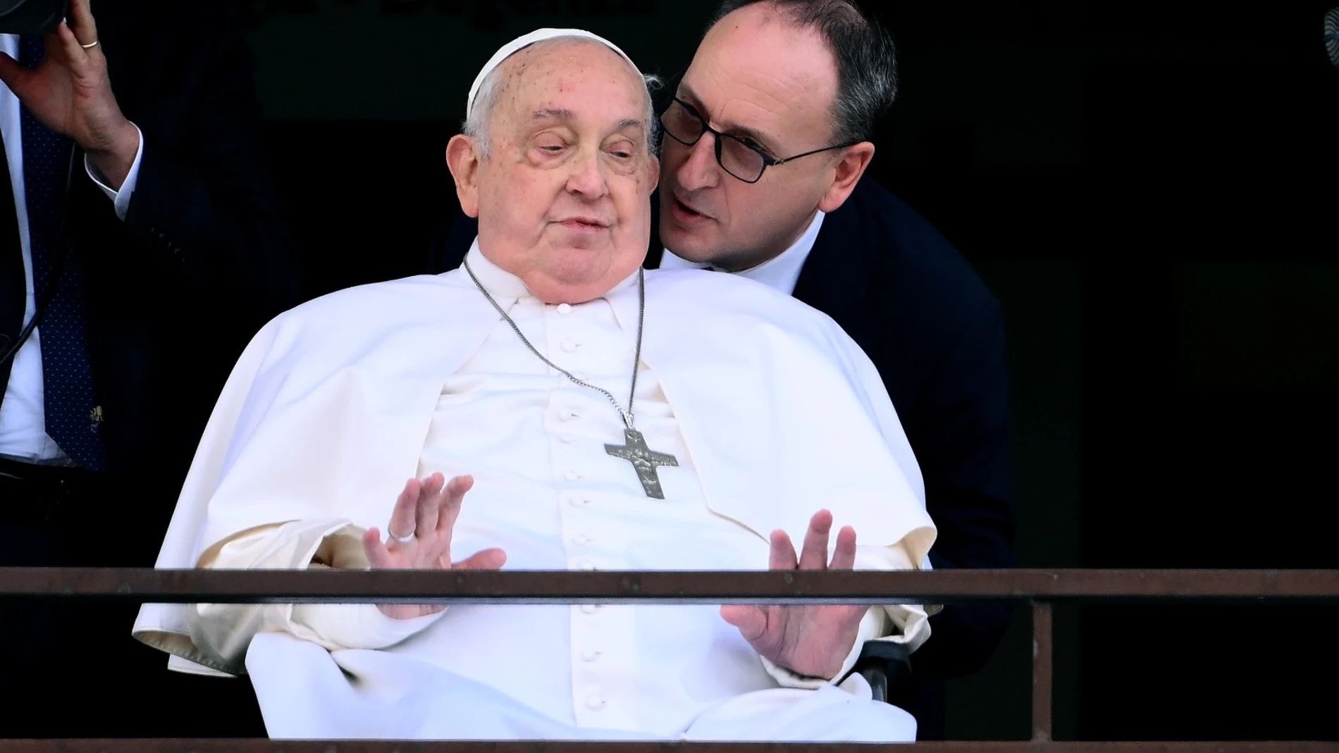 Pope Francis (L) greets and blesses the faithful from the balcony of the Gemelli hospital where has been hospitalized, in Rome, Italy, 23 March 2025.. Massimiliano Strappetti