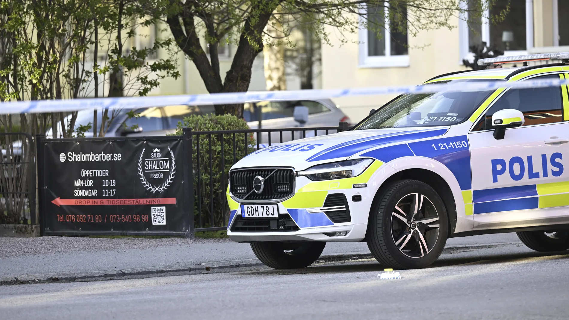 A police vehicle at the scene after a shooting incident, at Vaksala Square, in central Uppsala, Sweden, Tuesday, April 29, 2025. (Fredrik Sandberg/TT News Agency via AP)
