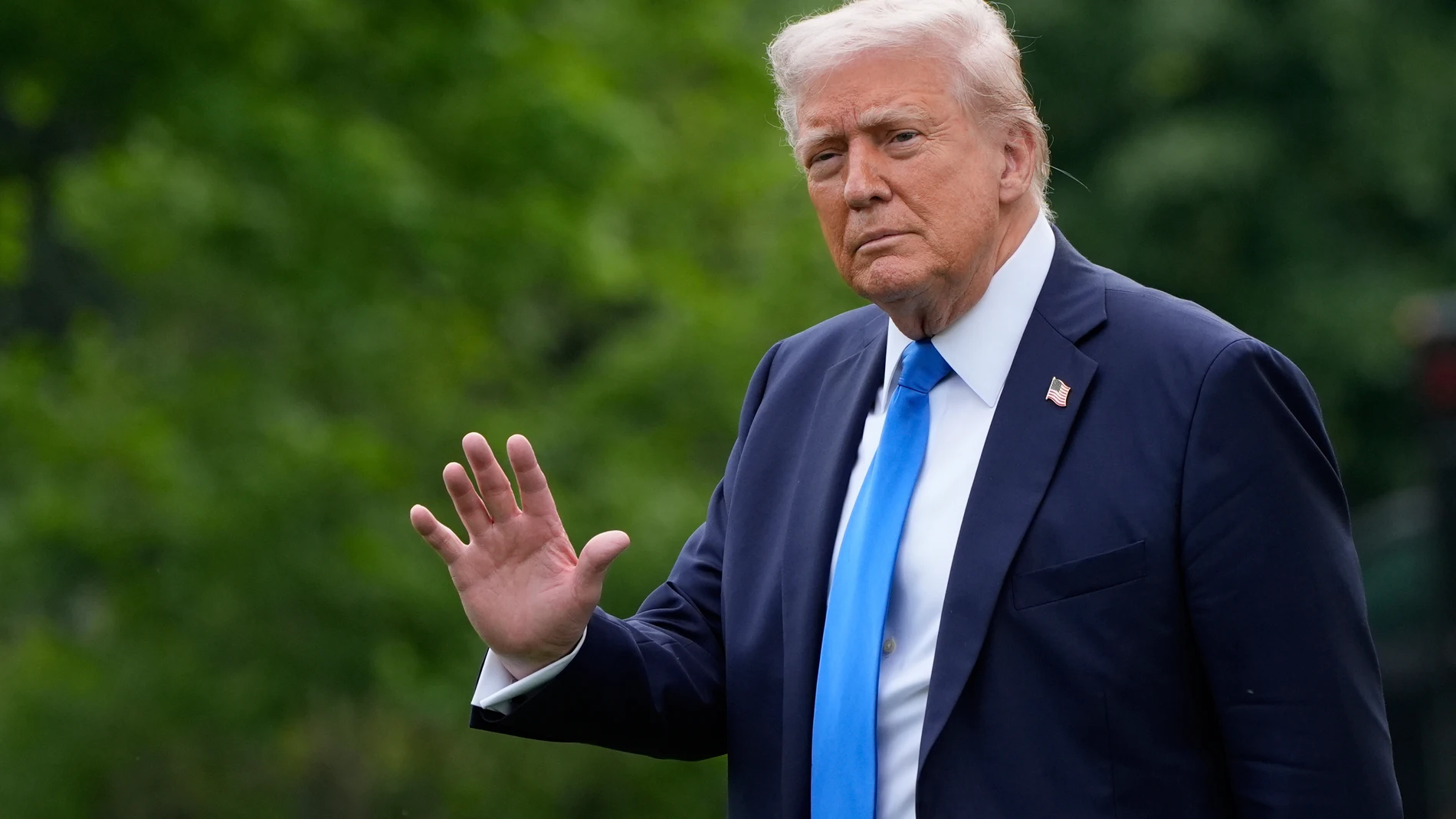 President Donald Trump waves as he walks from the Oval Office to depart on Marine One from the South Lawn of the White House, Thursday, May 1, 2025, in Washington. (AP Photo/Alex Brandon)
