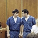 Lyle, left, and Erik Menendez leave a courtroom in Santa Monica, Calif., Aug. 6, 1990, after a judge ruled that conversations between the brothers and their psychologist after their parents were slain were not privileged and could be used as evidence.