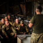 Ukrainian servicemen hold positions in the Kharkiv region