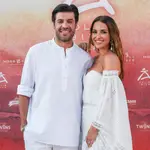 Paula Echevarría y Miguel Torres con total looks en blanco para el desfile de Adlib Ibiza.