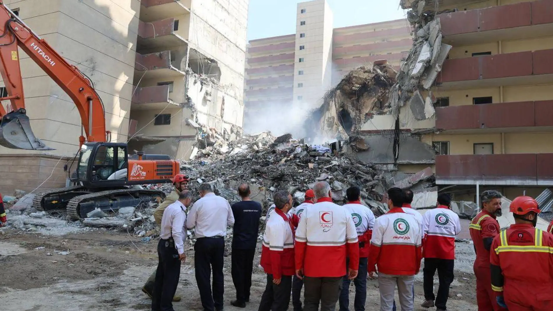June 14, 2025, Tehran, Iran: Rescue teams are working outside a building that was struck by an Israeli airstrike in Tehran. On June 13, Israel launched airstrikes against Iran, targeting its nuclear and military facilities, as well as residential buildings in Tehran. This action followed a warning from U.S. President Donald Trump about the potential for a massive conflict in the region. Europa Press/Contacto/Ircs 14/06/2025 ONLY FOR USE IN SPAIN