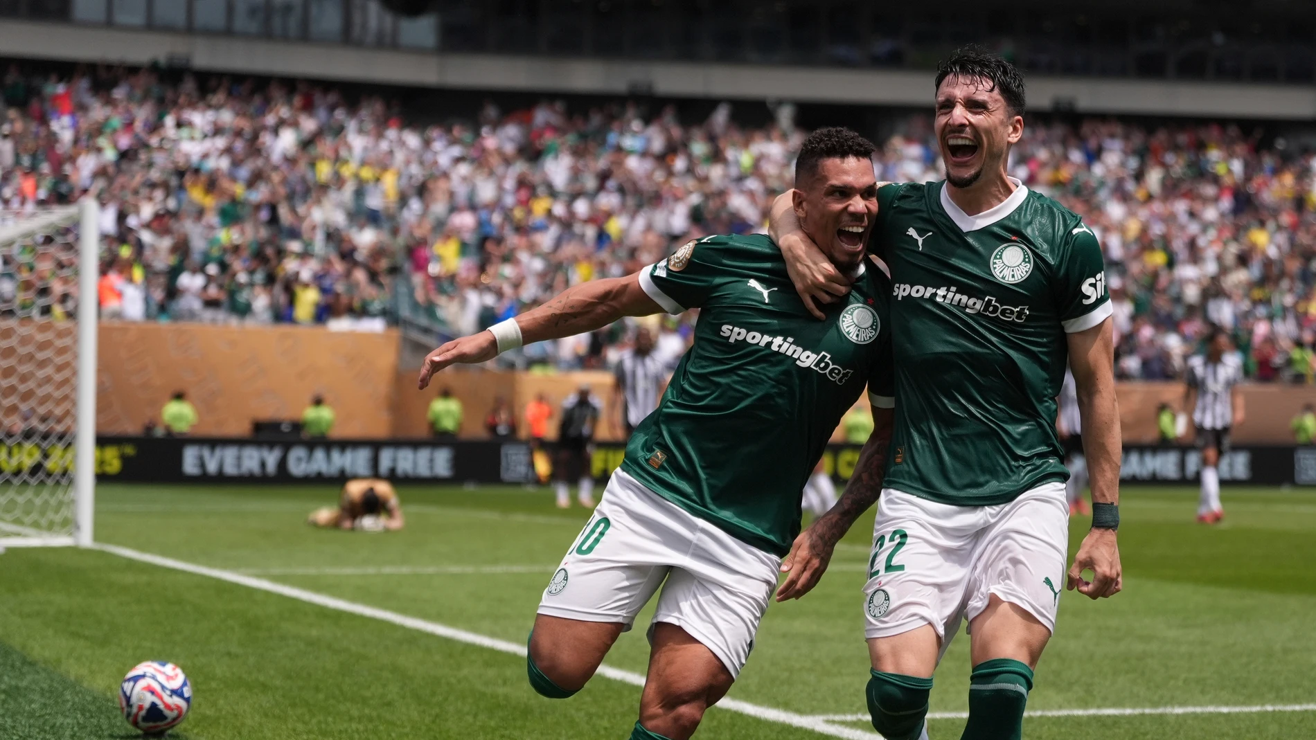 Palmeiras' Paulinho, left and Joaquin Piquerezd celebrate during the Club World Cup round of 16 soccer match between Palmeiras and Botafogo in Philadelphia, Saturday, June 28, 2025. (AP Photo/Matt Slocum)
