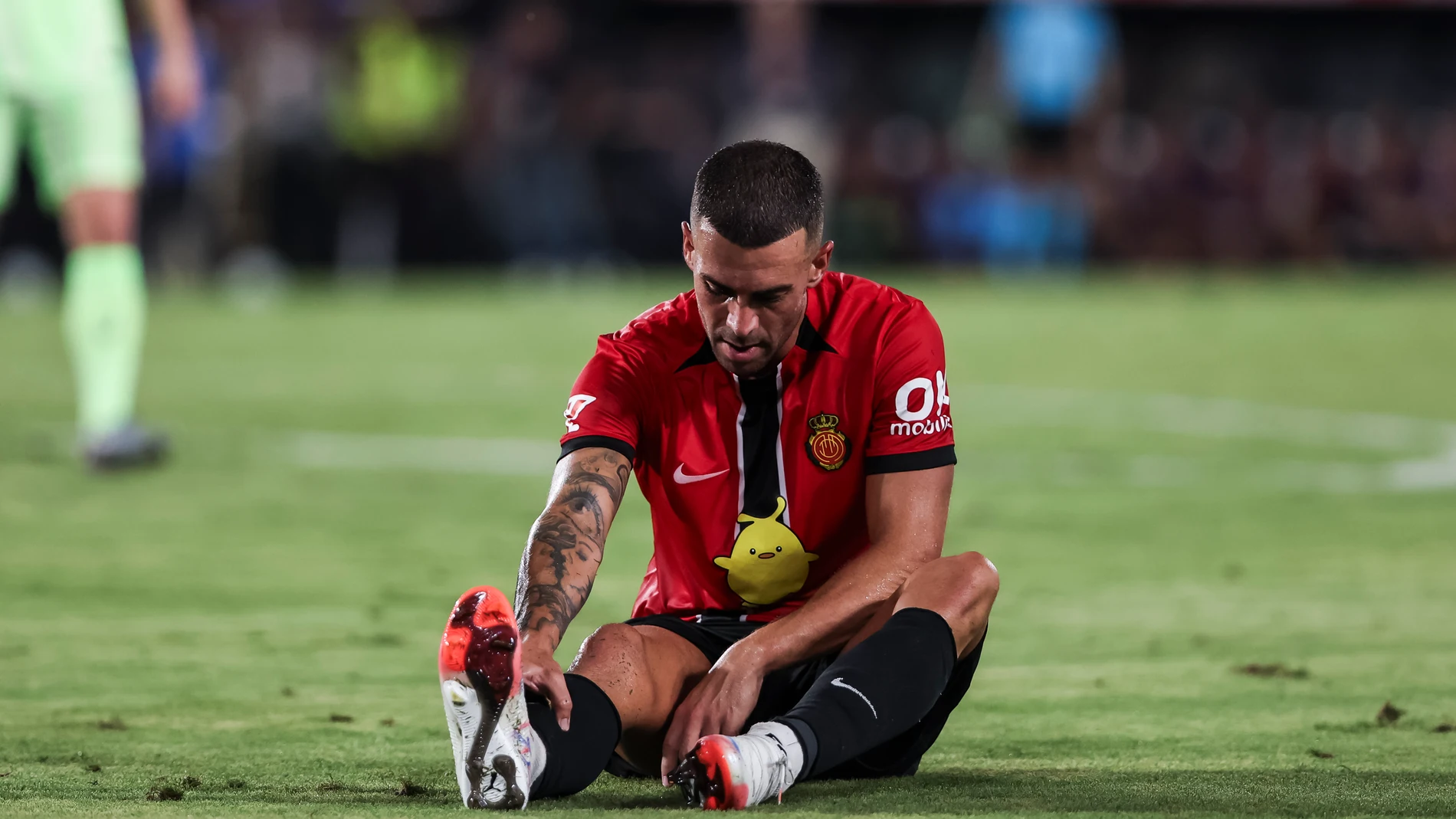 Dani Rodriguez of RCD Mallorca hurts during the Spanish league, La Liga EA Sports, football match played between RCD Mallorca and FC Barcelona at Son Moix Stadium on August 16, 2025 in Mallorca, Spain. AFP7 16/08/2025 ONLY FOR USE IN SPAIN