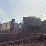 Casas quemadas en el incendio de Lusio por los incendios