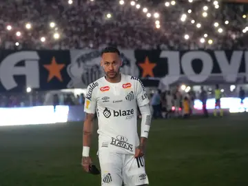 Santos-Coach Fired Soccer FILE - Brazil's Neymar walk onto the pitch during his debut for Santos FC in a Sao Paulo league soccer match against Botafogo-SP, in Santos, Brazil, Feb. 5, 2025. (AP Photo/Andre Penner, file)