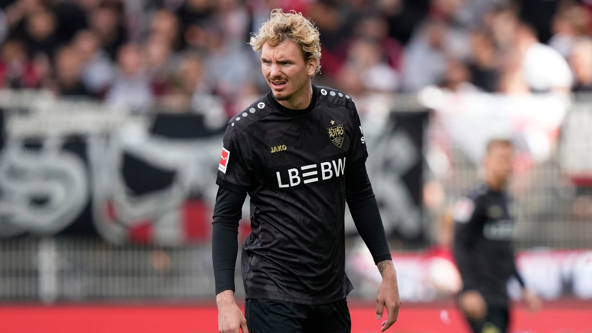 Stuttgart's Nick Woltemade looks on during the German Bundesliga soccer match between FC Union Berlin and VfB Stuttgart, at the An der Alten Forsterei stadium in Berlin, Germany, Saturday, Aug. 23, 2025. (AP Photo/Ebrahim Noroozi)