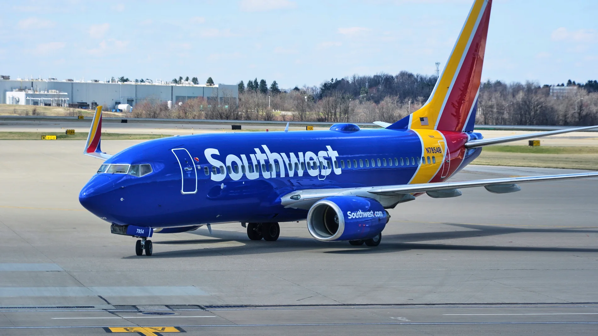 FILE - A Southwest Airlines plane pull into a gate at Pittsburgh International Airport in Imperial, Pa., Thursday, March 27, 2025. (AP Photo/Gene J. Puskar, File)