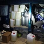 Garrafas de gasolina intervenidas en Chiclana de la Frontera (Cádiz)