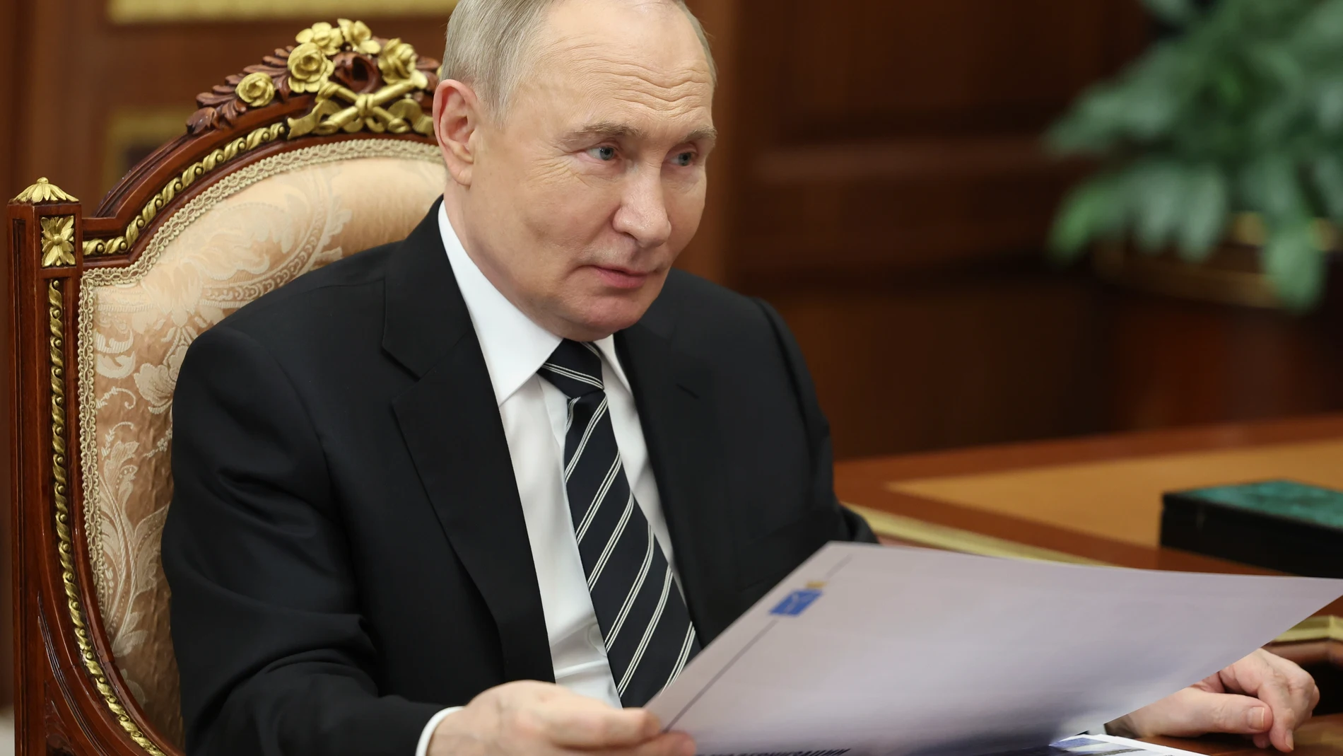 Russian President Vladimir Putin speaks during a meeting with Saratov Region Governor Roman Busargin at the Kremlin in Moscow, Russia, Thursday, Aug. 28, 2025. (Vyacheslav Prokofyev, Sputnik, Kremlin Pool Photo via AP)