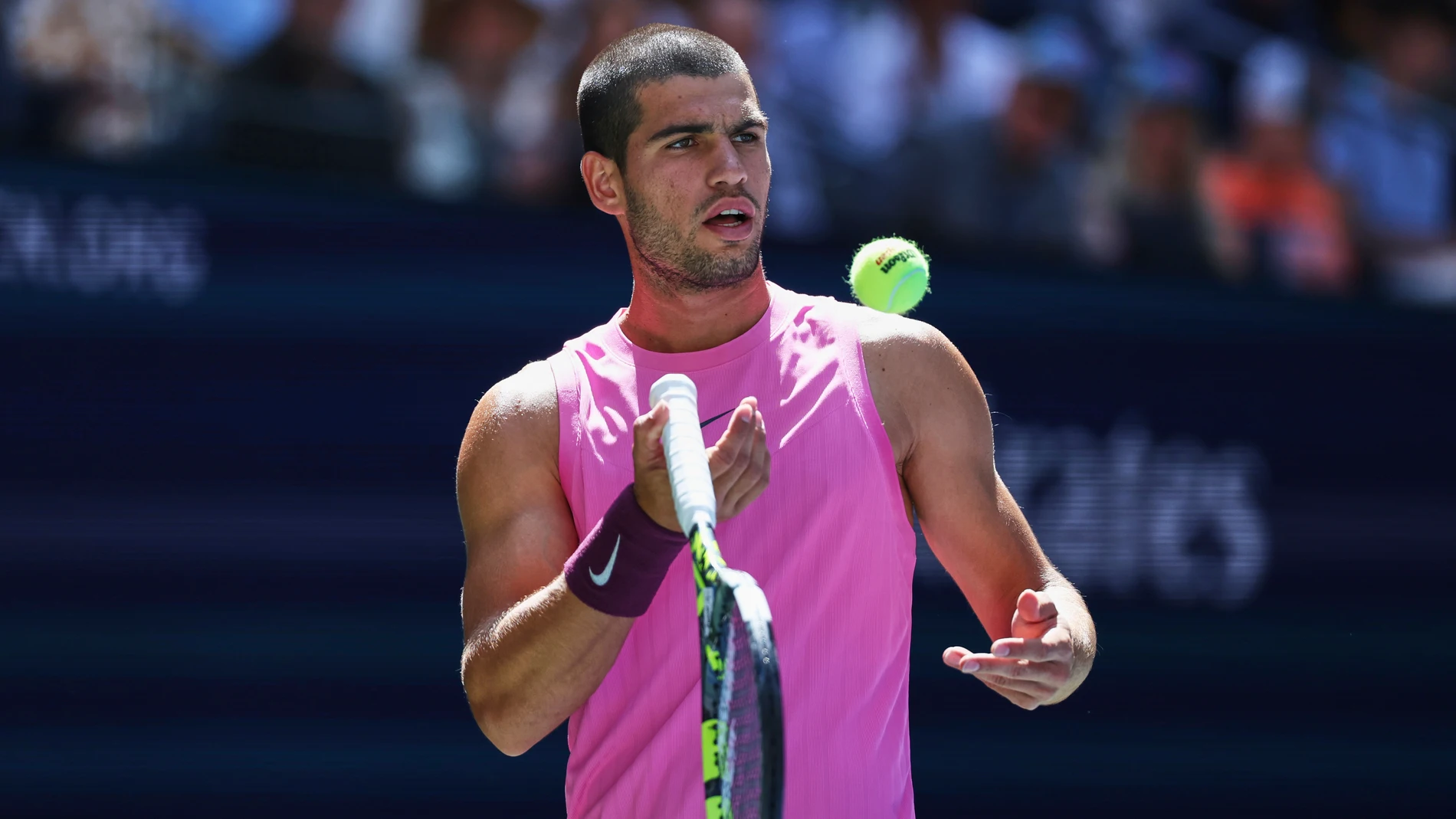Carlos Alcaraz, of Spain, readies to serve against Arthur Rinderknech, of France, during the fourth round of the U.S. Open tennis championships, Sunday, Aug. 31, 2025, in New York. (AP Photo/Heather Khalifa)