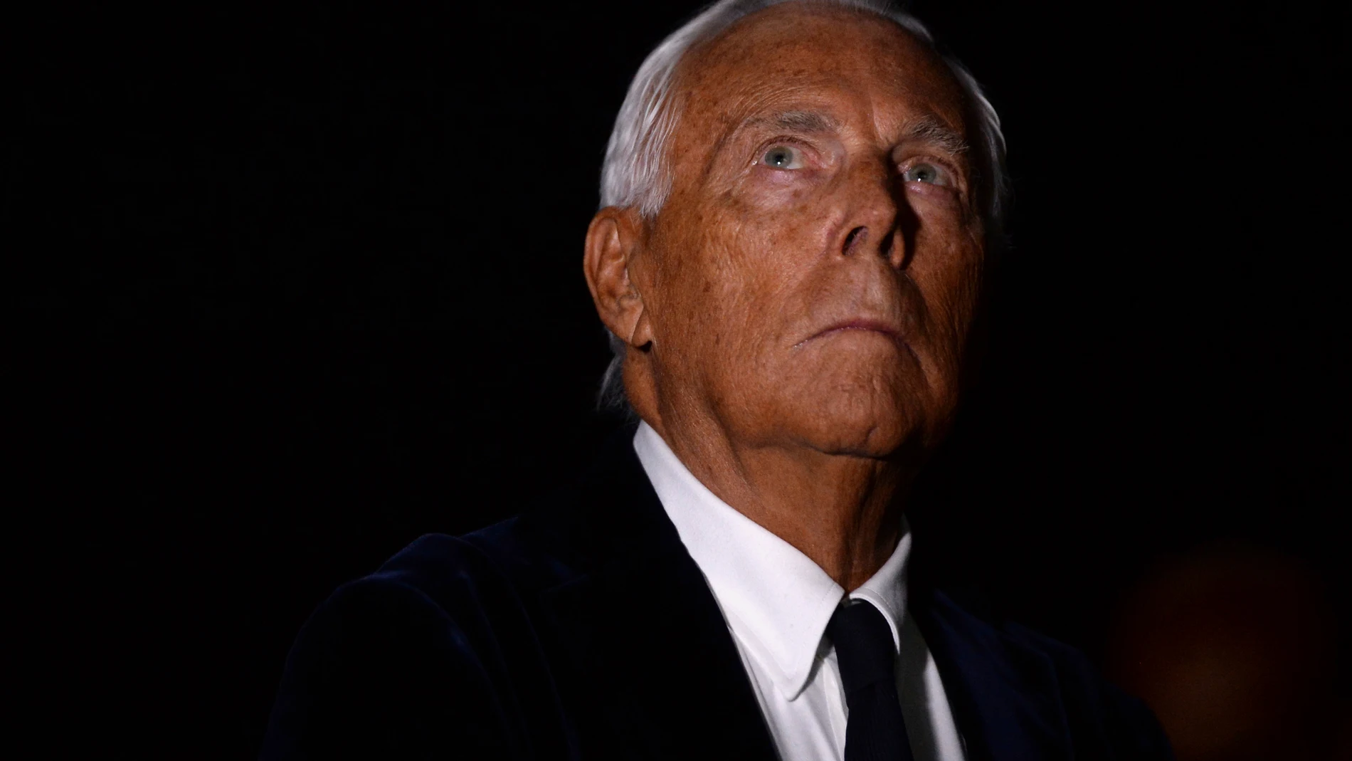 FILE - Italian designer Giorgio Armani attends his Haute Couture Fall Winter 2016/17 collection show in Moscow, Russia, April 14, 2016. (AP Photo/ Pavel Bednyakov, File)