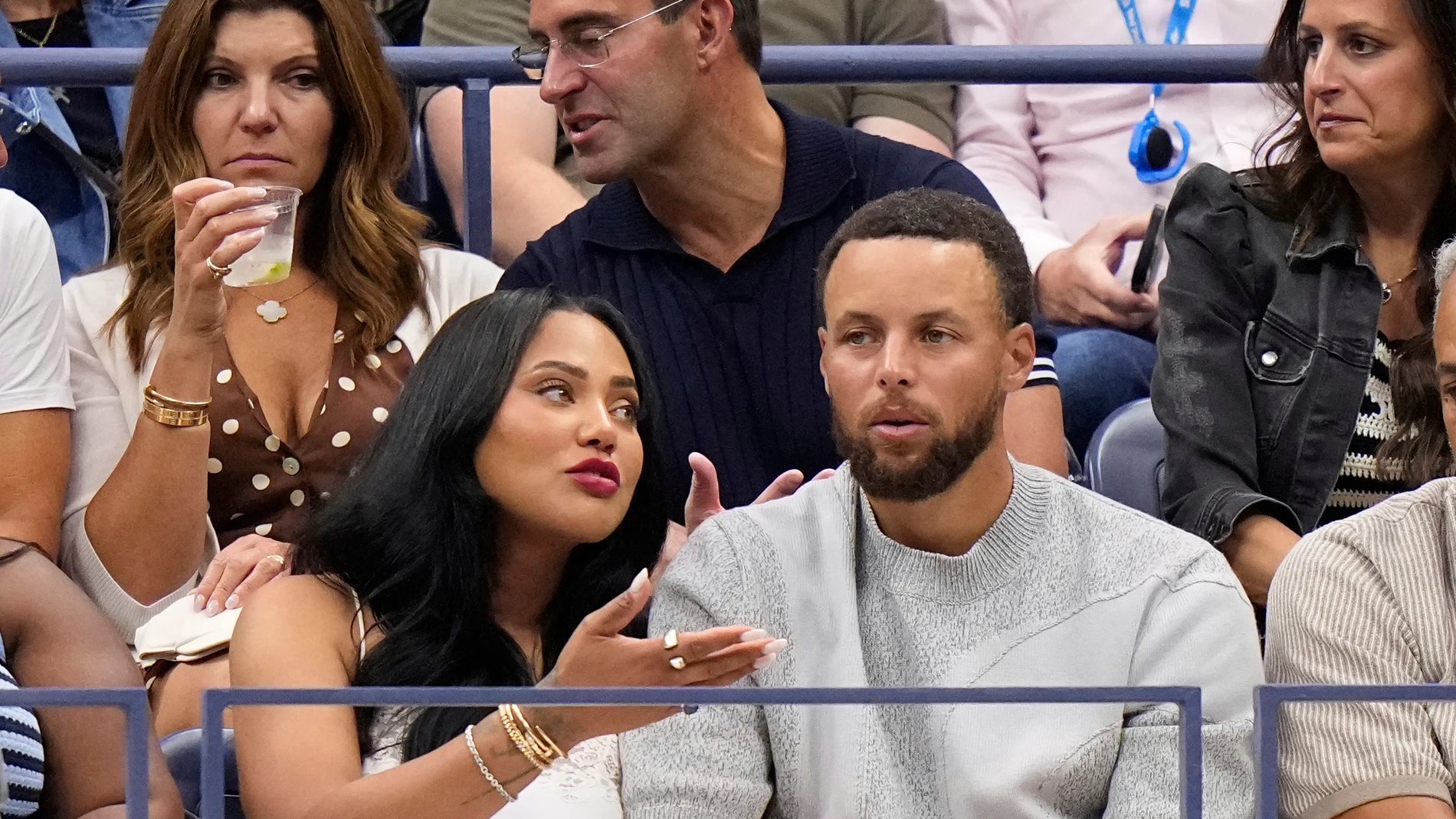 Steph Curry, right, and his wife Ayesha attend the men's singles final of the U.S. Open tennis championships, Sunday, Sept. 7, 2025, in New York. (AP Photo/Frank Franklin)