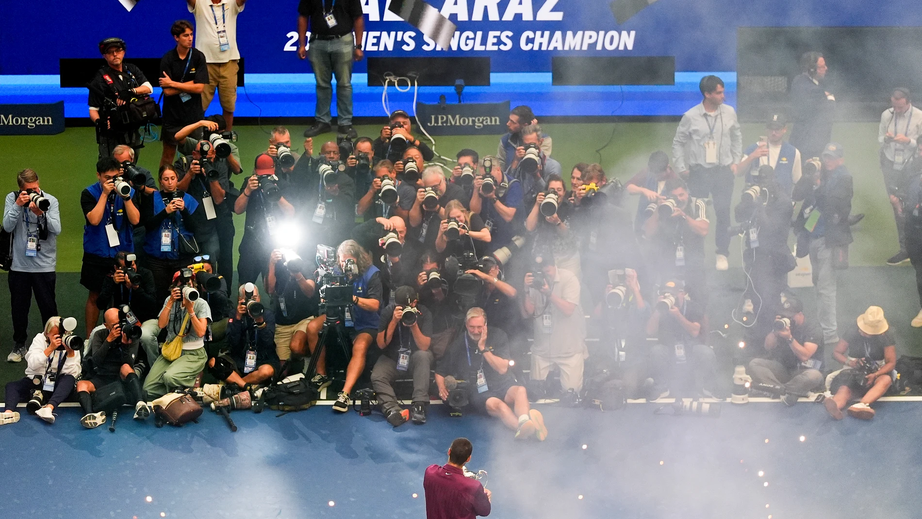 Carlos Alcaraz, of Spain, holds the championship trophy after defeating Jannik Sinner, of Italy, in the men's singles final of the U.S. Open tennis championships, Sunday, Sept. 7, 2025, in New York. (AP Photo/Yuki Iwamura)