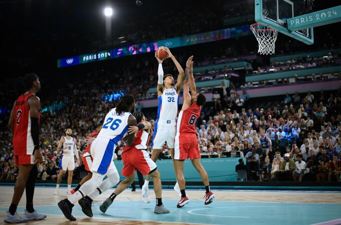 Trey Lyles, en los pasados Juegos Olímpicos, defiende a Wembanyama