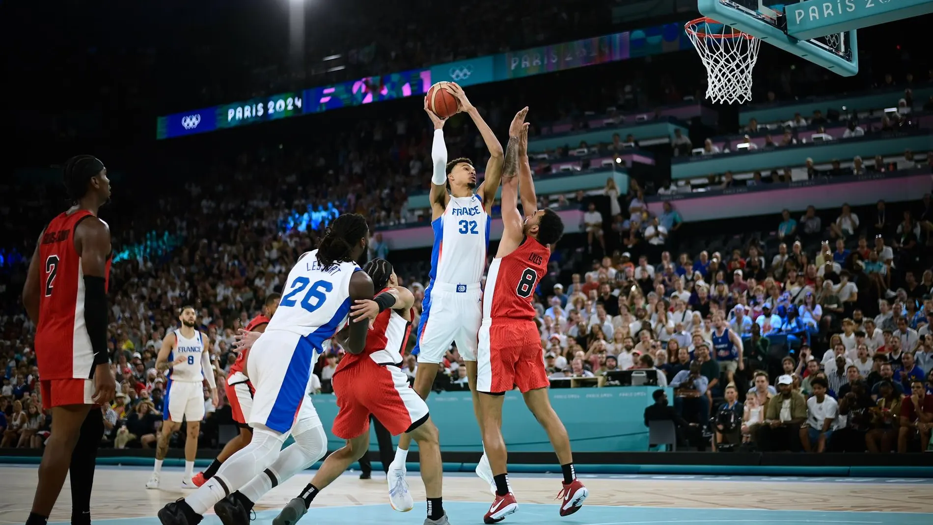 Trey Lyles, en los pasados Juegos Olímpicos, defiende a Wembanyama