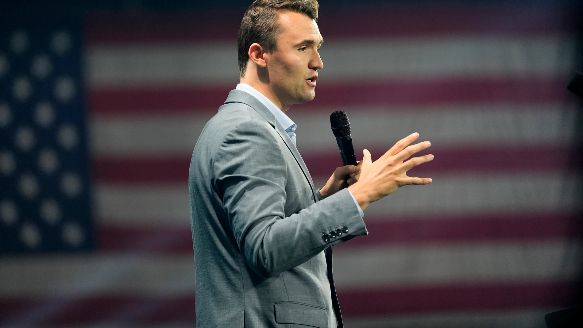 FILE - Turning Point USA Founder Charlie Kirk speaks before Republican presidential candidate former President Donald Trump arrives at the Turning Point Believers' Summit, July 26, 2024, in West Palm Beach, Fla. (AP Photo/Alex Brandon, File)