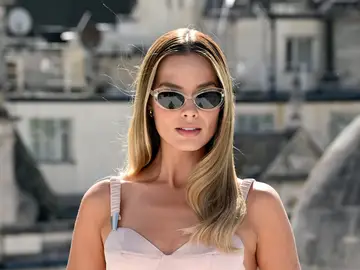 Margot Robbie y su cuidada melena rubia. Margot Robbie y su cuidada melena rubia.