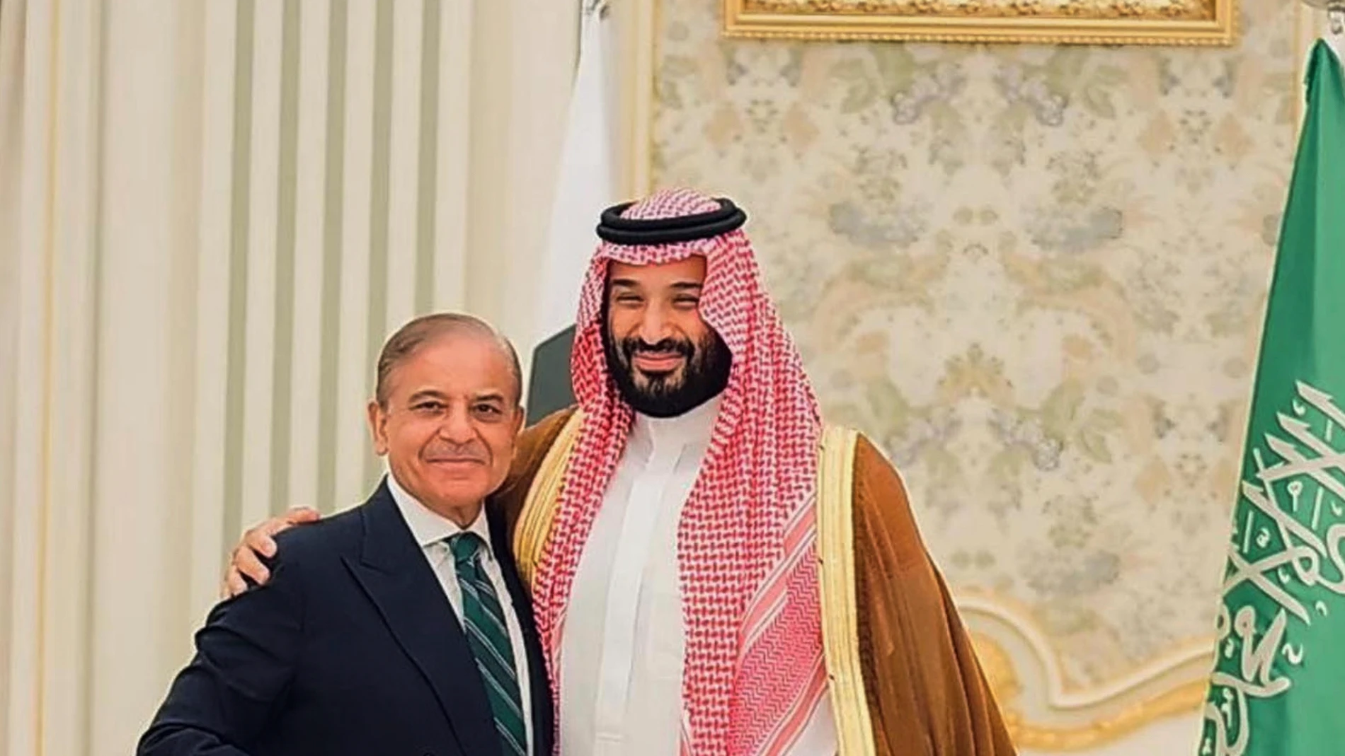 In this photo released by Pakistan's Press Information Department, Saudi Arabia's Crown Prince Mohammed bin Salman, right, and Pakistan's Prime Minister Shehbaz Sharif pose for photograph after signing a mutual defense pact, in Riyadh, Saudi Arabia, Wednesday, Sept. 17, 2025. (Press Information Department via AP)