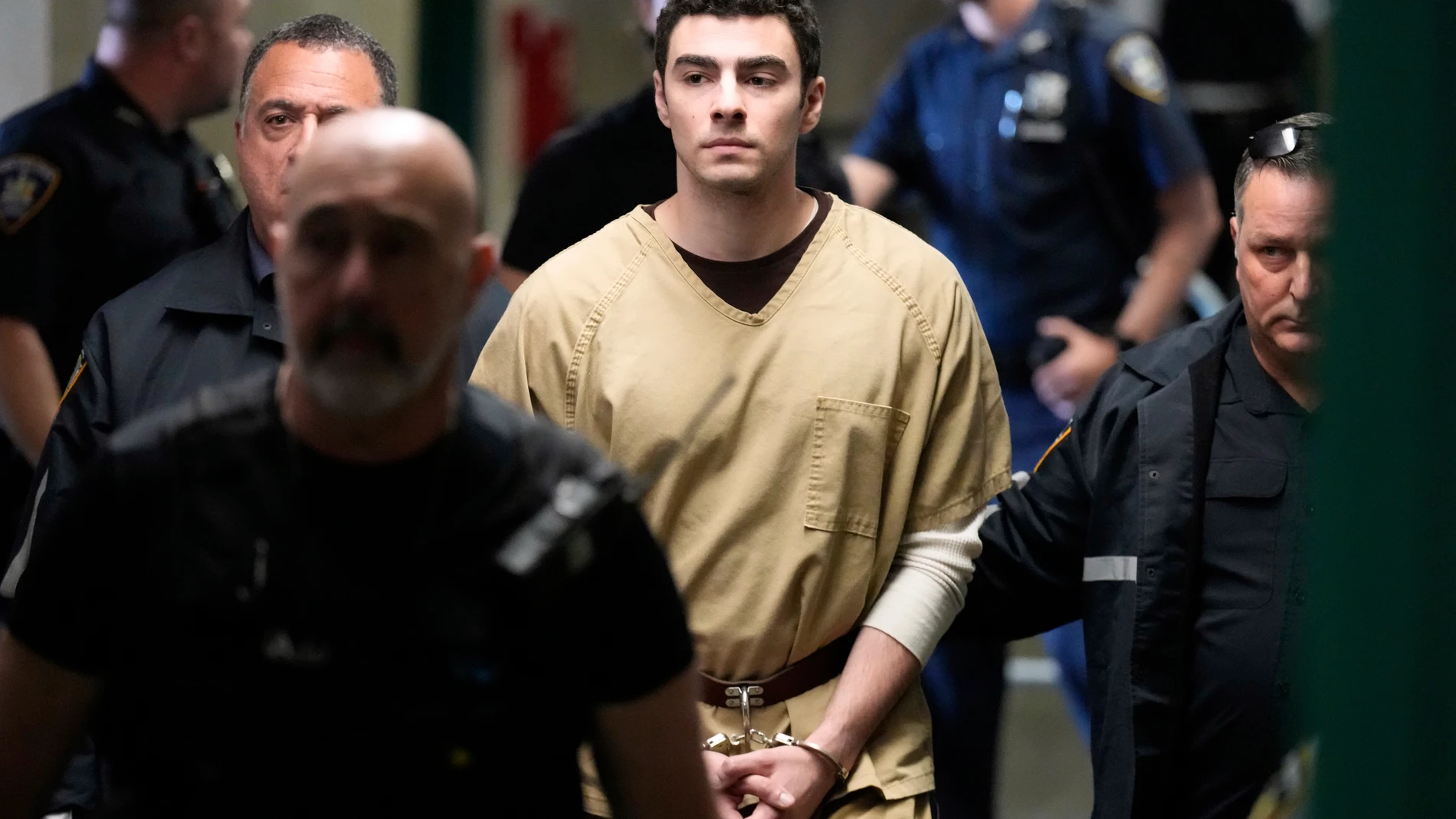 Luigi Mangione is escorted into Manhattan state court in New York, Tuesday, Sept. 16, 2025. (AP Photo/Seth Wenig)