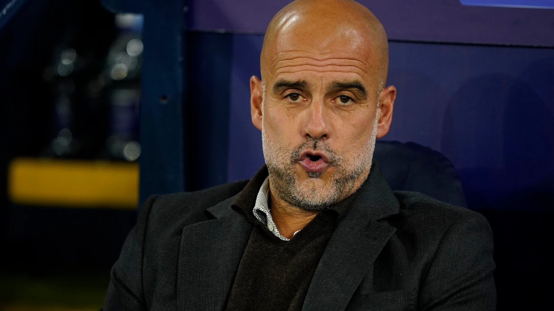 Manchester City's head coach Pep Guardiola waits for the start of the Champions League opening phase soccer match between Manchester City and Napoli at the Etihad Stadium in Manchester, England, Thursday, Sept. 18, 2025. (AP Photo/Dave Thompson)