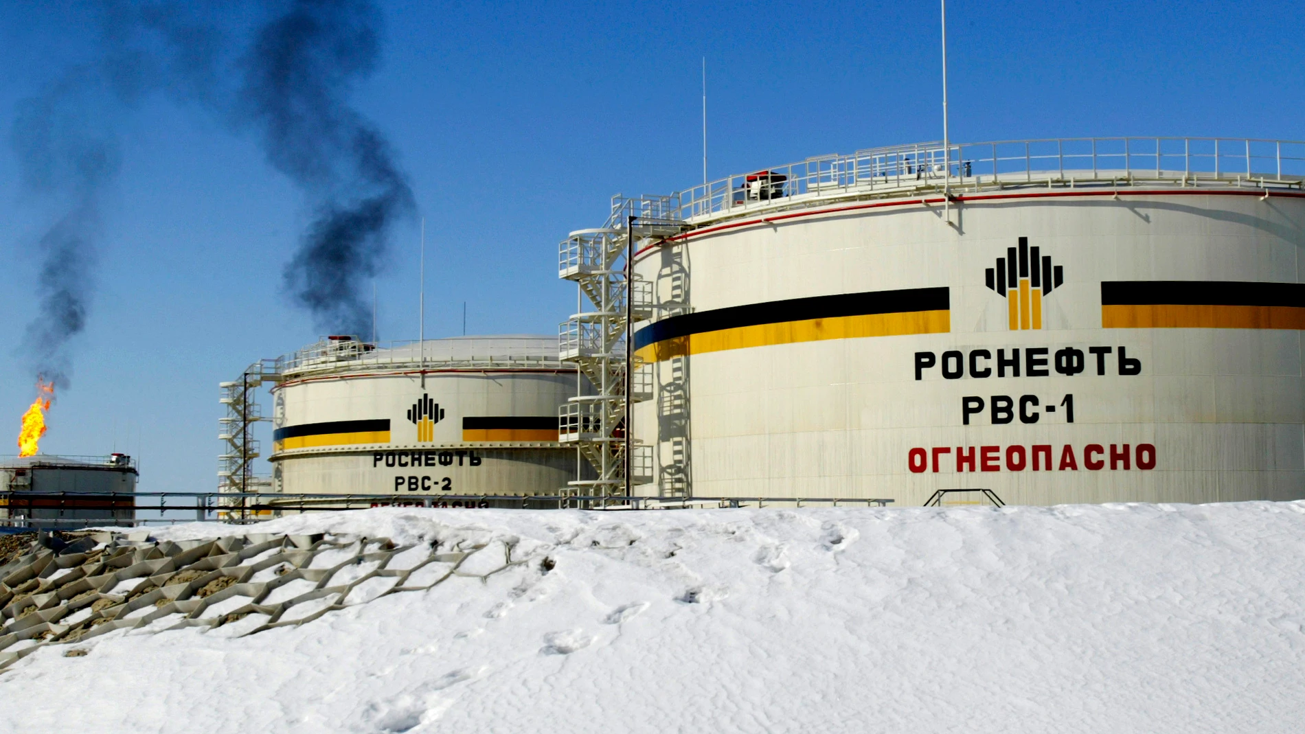 FILE - A view of reservoirs of Russian state-controlled oil giant OAO Rosneft, at Priobskoye oil field near Nefteyugansk, in western Siberia, Russia, April 5, 2006. (AP Photo/Misha Japaridze, File)