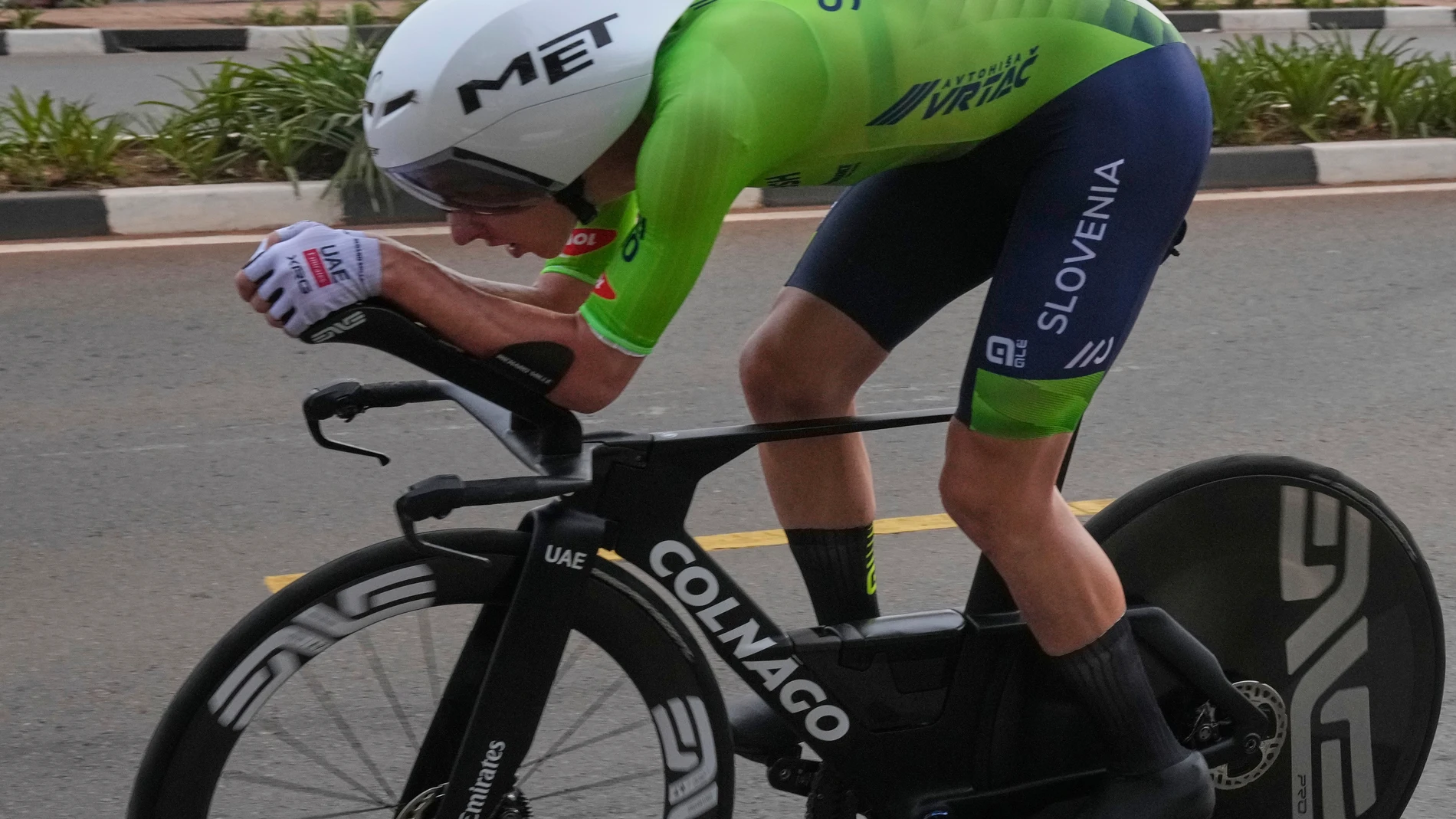 Slovenia's Tadej Pogacar competes, during the men's elite individual time trial event, at the road cycling World Championships in Kigali, Rwanda, Sunday, Sept. 21, 2025. (AP Photo/Jerome Delay)