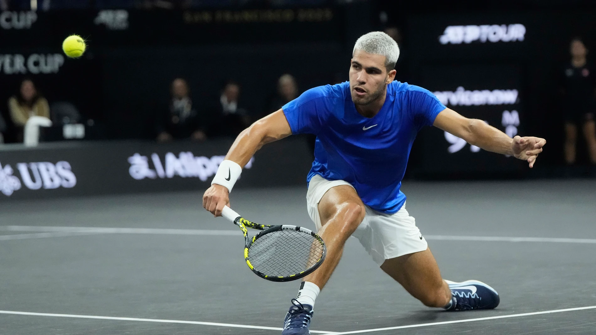 Team Europe's Carlos Alcaraz, of Spain, returns a shot against Team World's Taylor Fritz, of the United States, during their match on the second day of the Laver Cup tennis tournament in San Francisco, Saturday, Sept. 20, 2025. (AP Photo/Jeff Chiu)