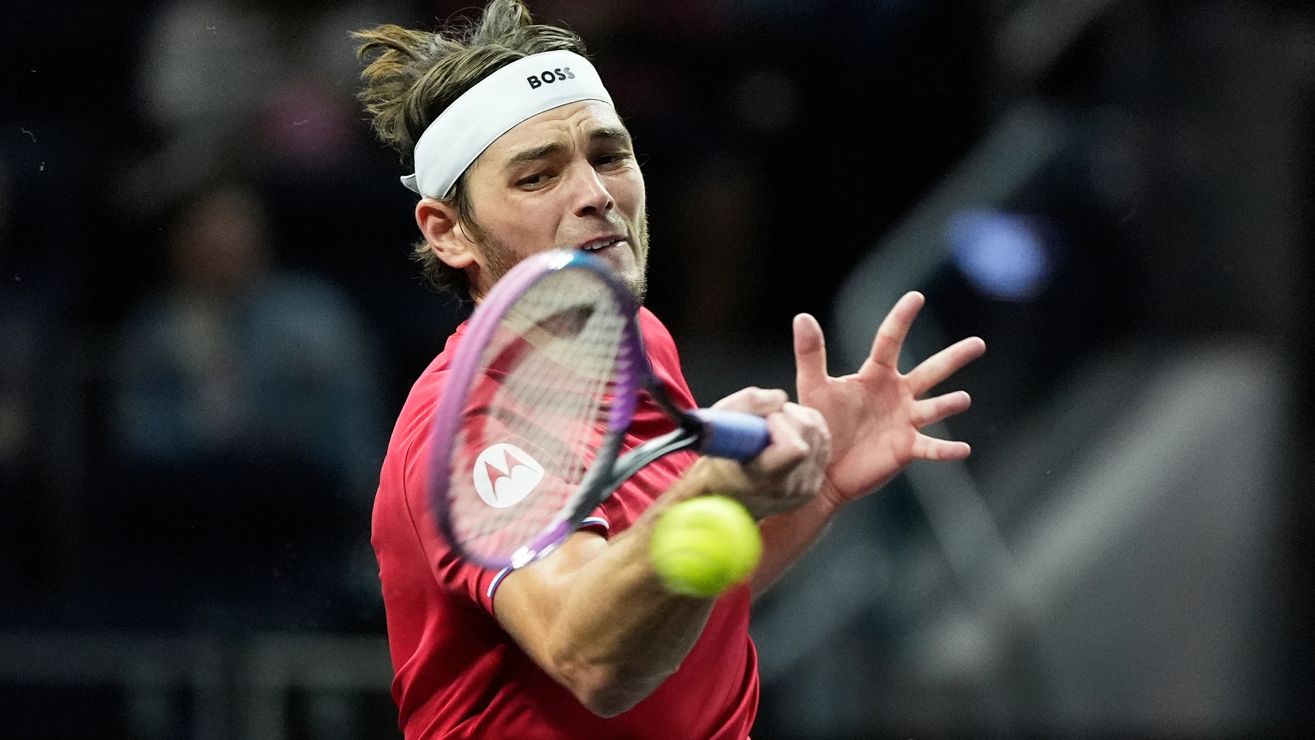 Team World's Taylor Fritz, of the United States, returns a shot against Team Europe's Alexander Zverev, of Germany, during their match on the third day of the Laver Cup tennis tournament in San Francisco, Sunday, Sept. 21, 2025. (AP Photo/Jeff Chiu)