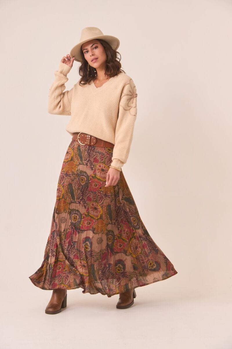 Jersey oversize flor mangas en color ivory.