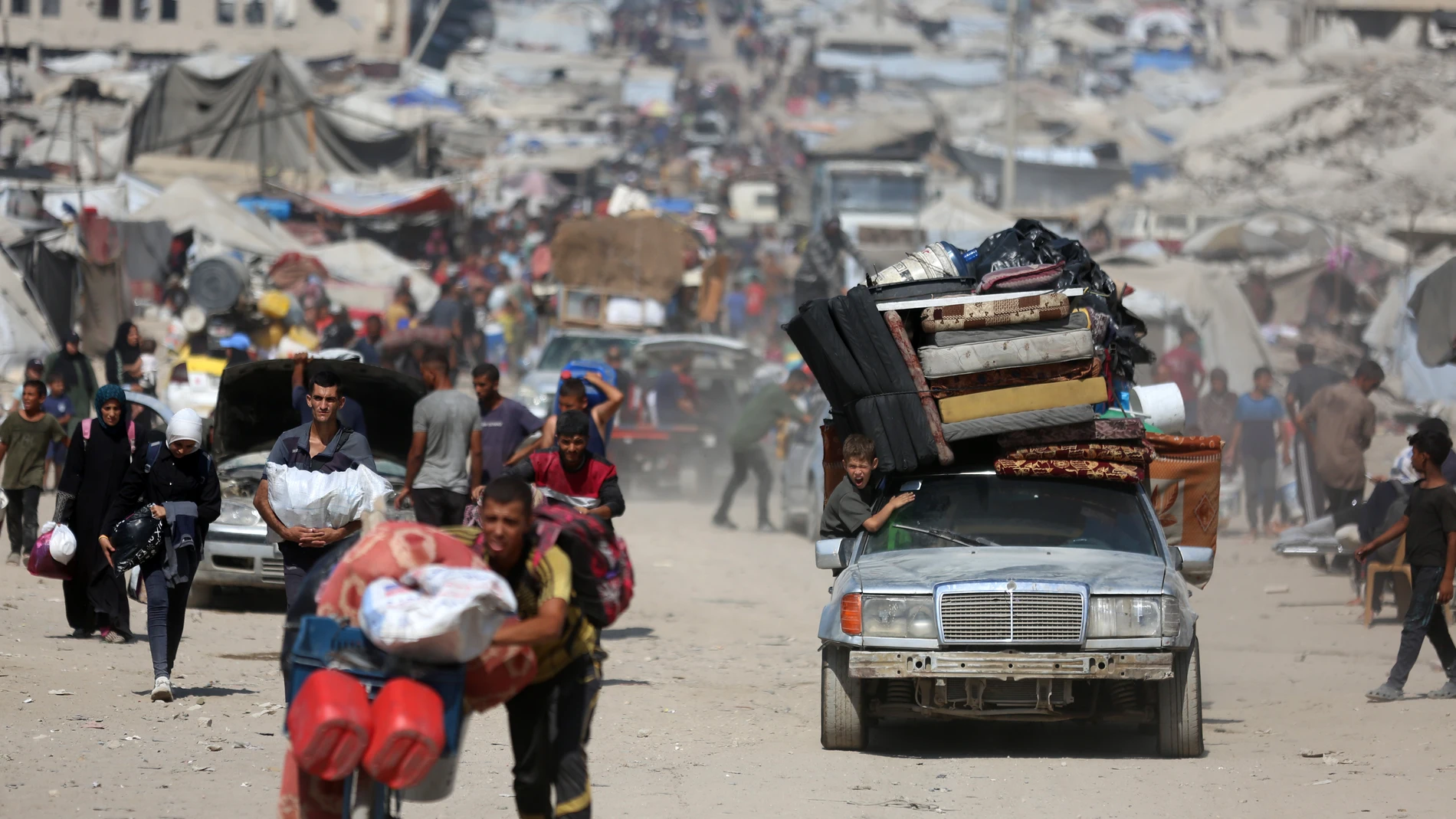 GAZA, Oct. 8, 2025 -- This photo taken on the Rashid road, the coastal road west of Gaza City, shows Palestinians from the northern Gaza Strip fleeing to the south amid the large-scale Israeli military operation in Gaza City, Sept. 18, 2025. As Hamas and Israel are meeting in Egypt over a potential ceasefire the world anxiously awaits, Gaza marked the grim second anniversary of the conflict on Tuesday. Over the past two years, what began as a cross-border attack by Hamas has, under the we...