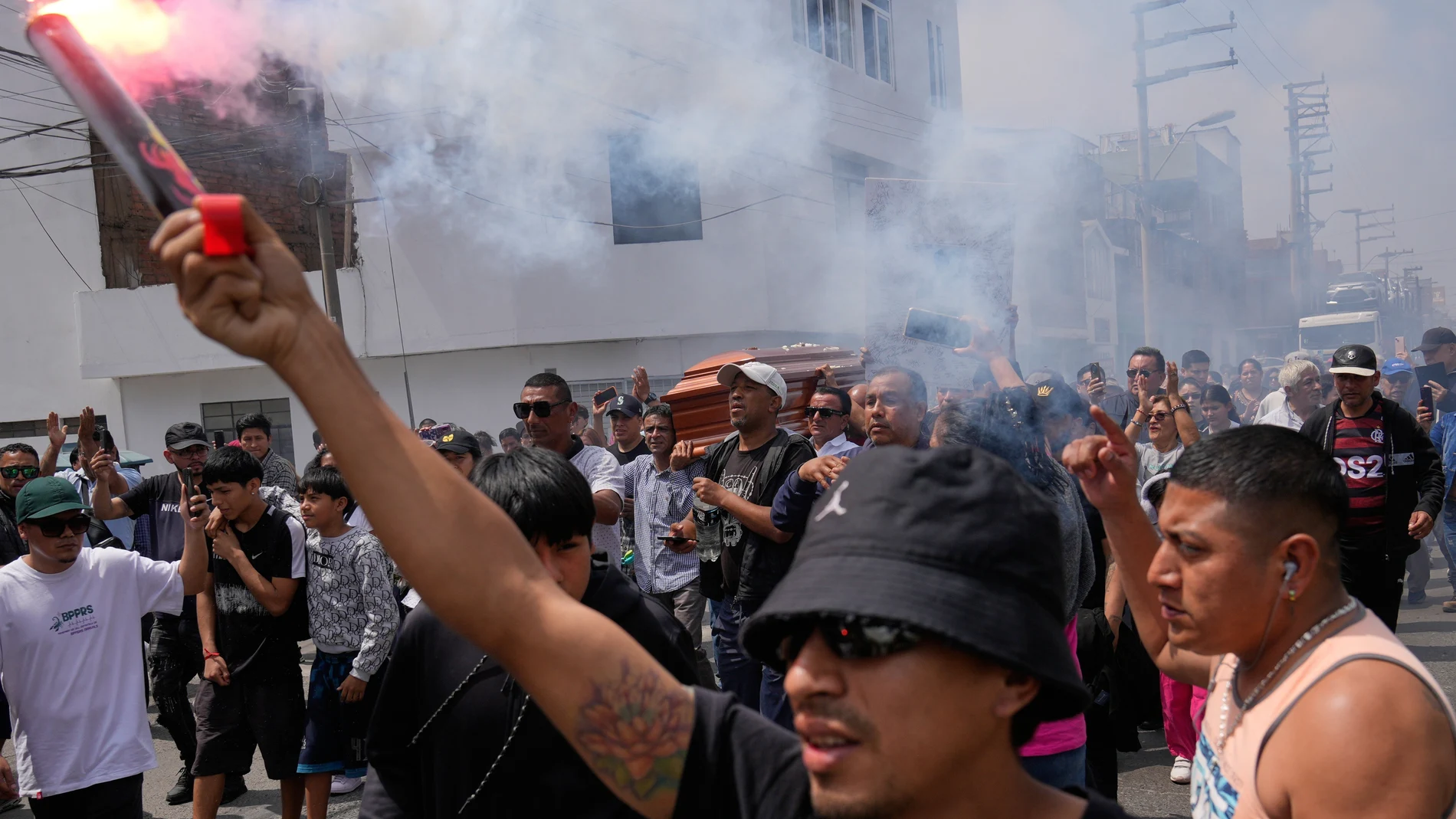 Relatives and friends carry the coffin of Eduardo Ruiz, a protester who died during an overnight protest against the newly installed President Jose Jeri in Lima, Peru, Saturday, Oct. 18, 2025.