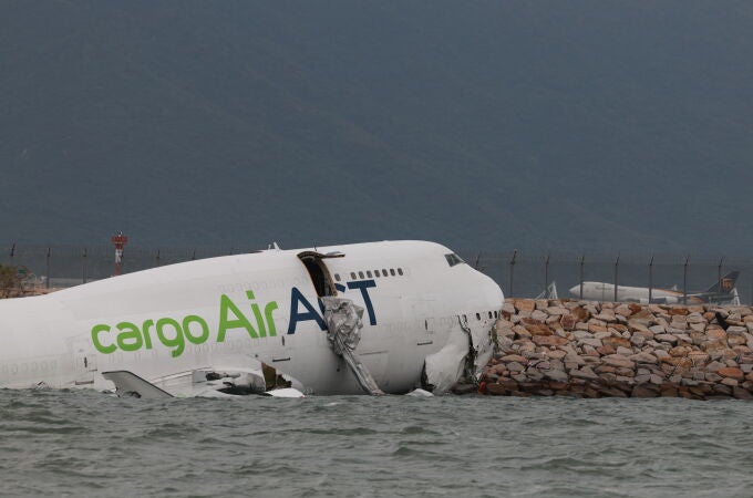 Cargo airplane skids off the runway at Hong Kong International Airport