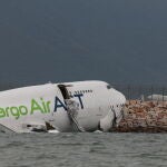 Cargo airplane skids off the runway at Hong Kong International Airport Cargo airplane skids off the runway at Hong Kong International Airport