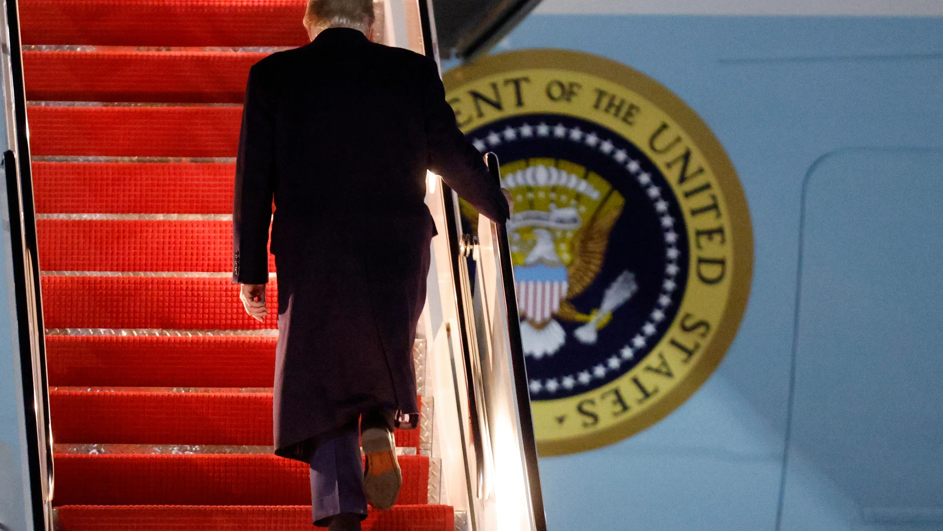 President Donald Trump walks up the stairs of Air Force One as he boards upon his arrival at Joint Base Andrews, Md., Friday, Oct. 24, 2025. (AP Photo/Luis M. Alvarez)