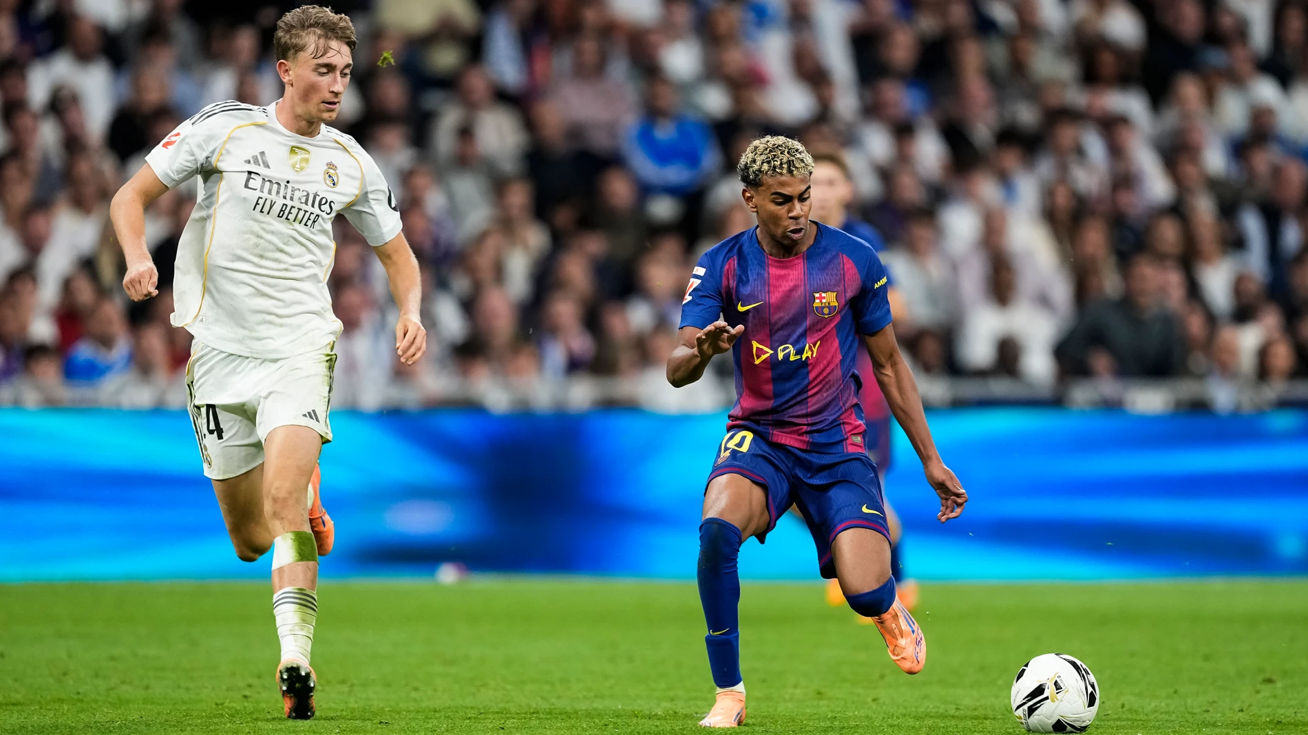Lamine Yamal of FC Barcelona and Dean Huijsen of Real Madrid CF in action during the Spanish League, LaLiga EA Sports, football match played between Real Madrid C.F. and FC Barcelona at Santiago Bernabeu stadium on October 26, 2025, in Madrid, Spain. AFP7 26/10/2025 ONLY FOR USE IN SPAIN