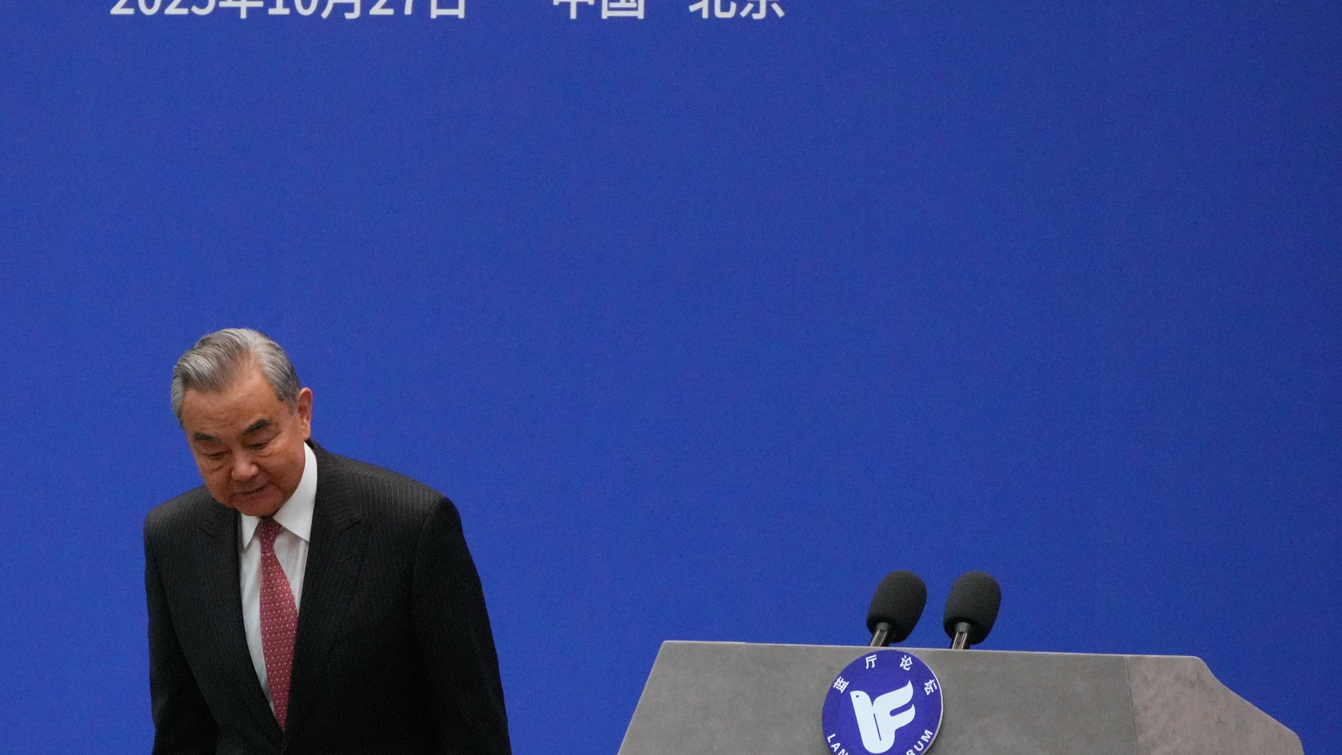 Chinese Foreign Minister Wang Yi bows after delivering his opening remarks at the Lanting Forum on Improving Global Governance to Build a Community with a Shared Future for Humanity, at the Ministry of Foreign Affairs office, in Beijing, Monday, Oct. 27, 2025. (AP Photo/Andy Wong)