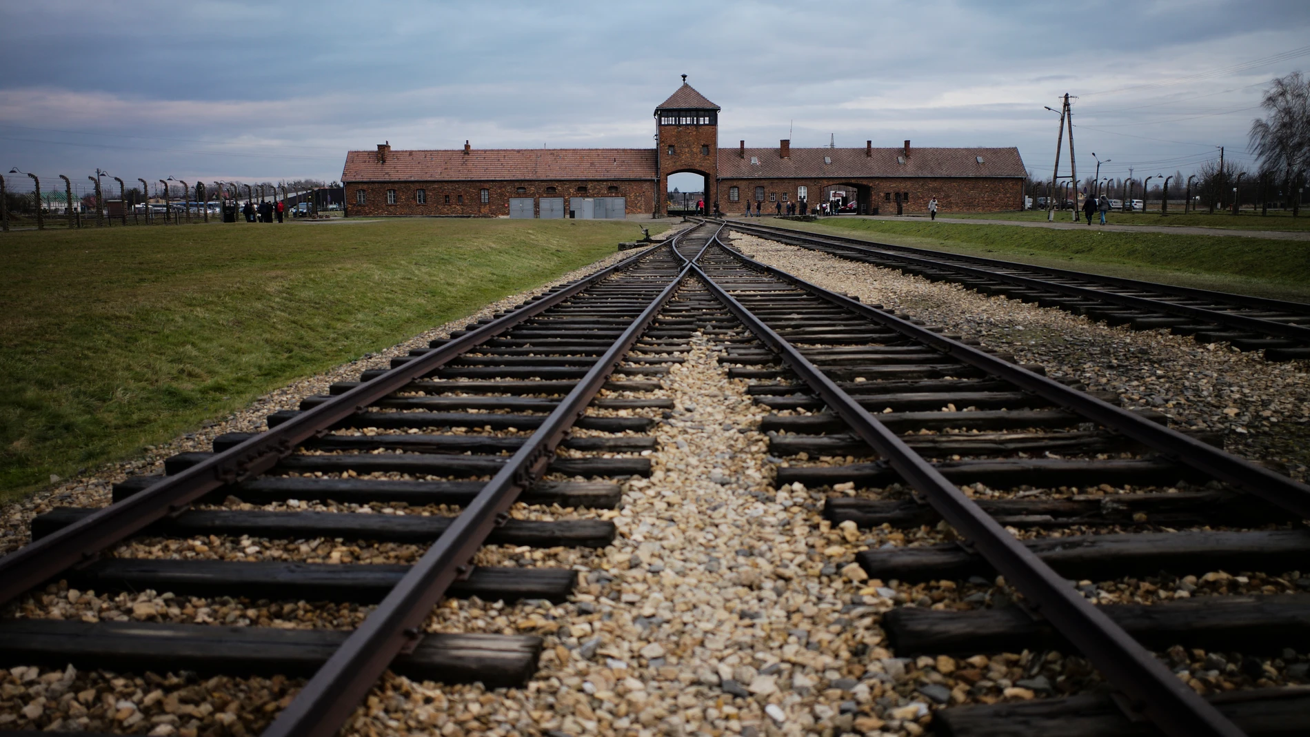 FILE - The railway tracks where hundred thousands of people arrived to be directed to the gas chambers inside the former Nazi death camp of Auschwitz Birkenau, or Auschwitz II, are pictured in Oswiecim, Poland, on Dec. 7, 2019. (AP Photo/Markus Schreiber, File)