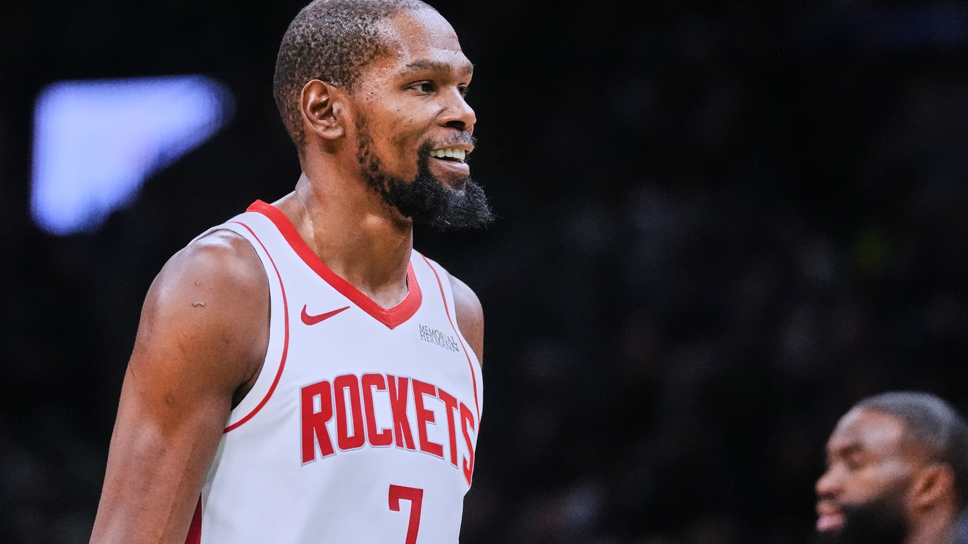 Houston Rockets forward Kevin Durant (7) smiles while leading the Boston Celtics during the second half of an NBA basketball game Saturday, Nov. 1, 2025, in Boston. (AP Photo/Charles Krupa)
