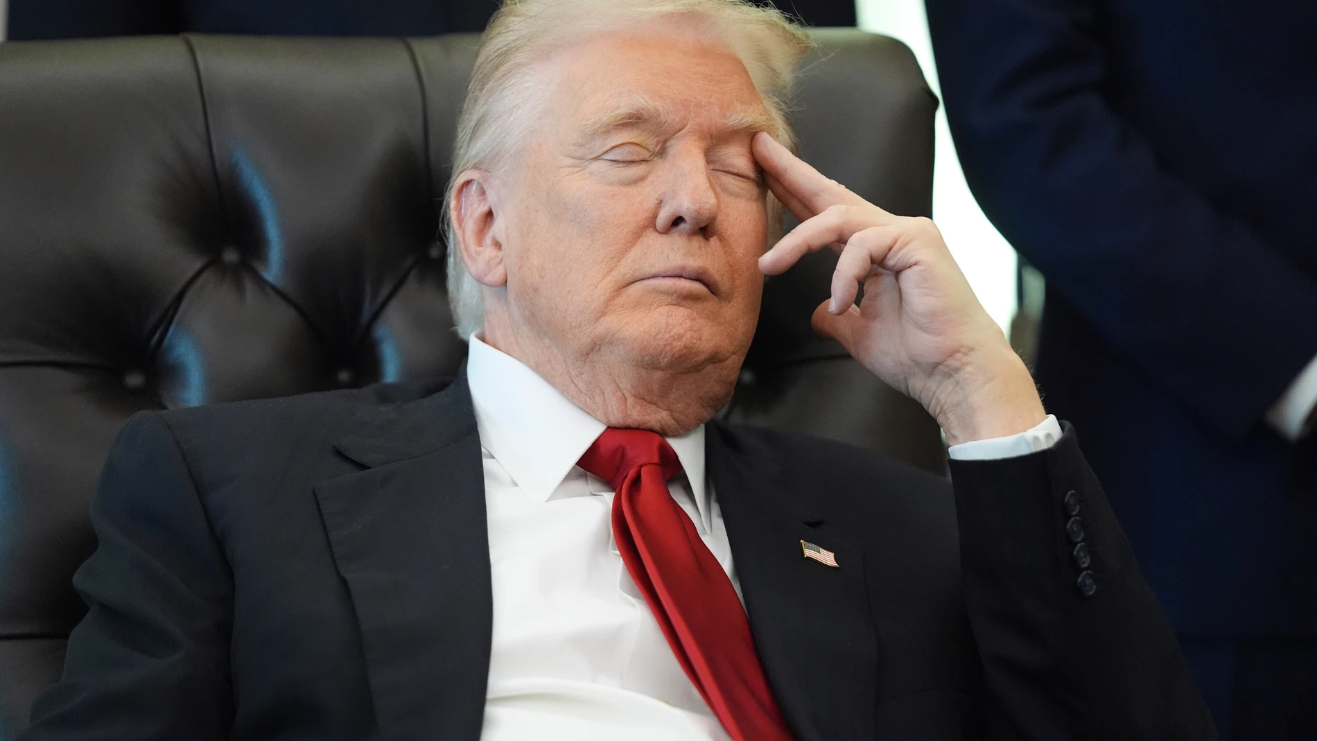 President Donald Trump listens as Health and Human Services Secretary Robert F. Kennedy Jr. speaks during an event about drug prices, Thursday, Nov. 6, 2025, in the Oval Office of the White House in Washington. (AP Photo/Evan Vucci)