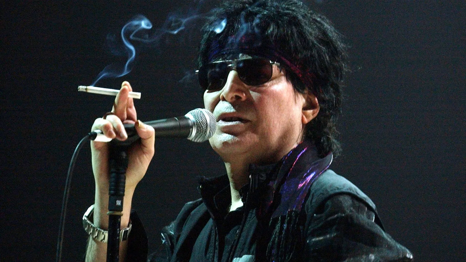 US singer Alan Vega performs 05 March 2004 in the western French city of Nantes as part of the I.D.E.A.L. Festival.