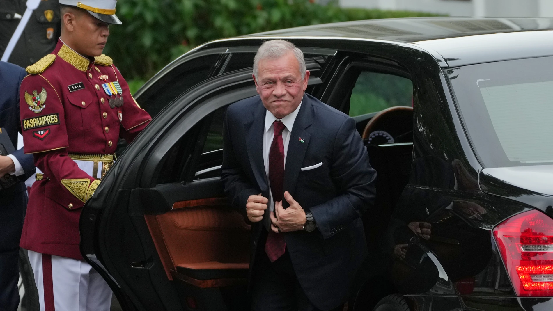 Jordanian King Abdullah II steps out of his car upon arrival for a meeting with Indonesian President Prabowo Subianto at Merdeka Palace in Jakarta, Indonesia, Friday, Nov. 14, 2025. (AP Photo/Achmad Ibrahim)
