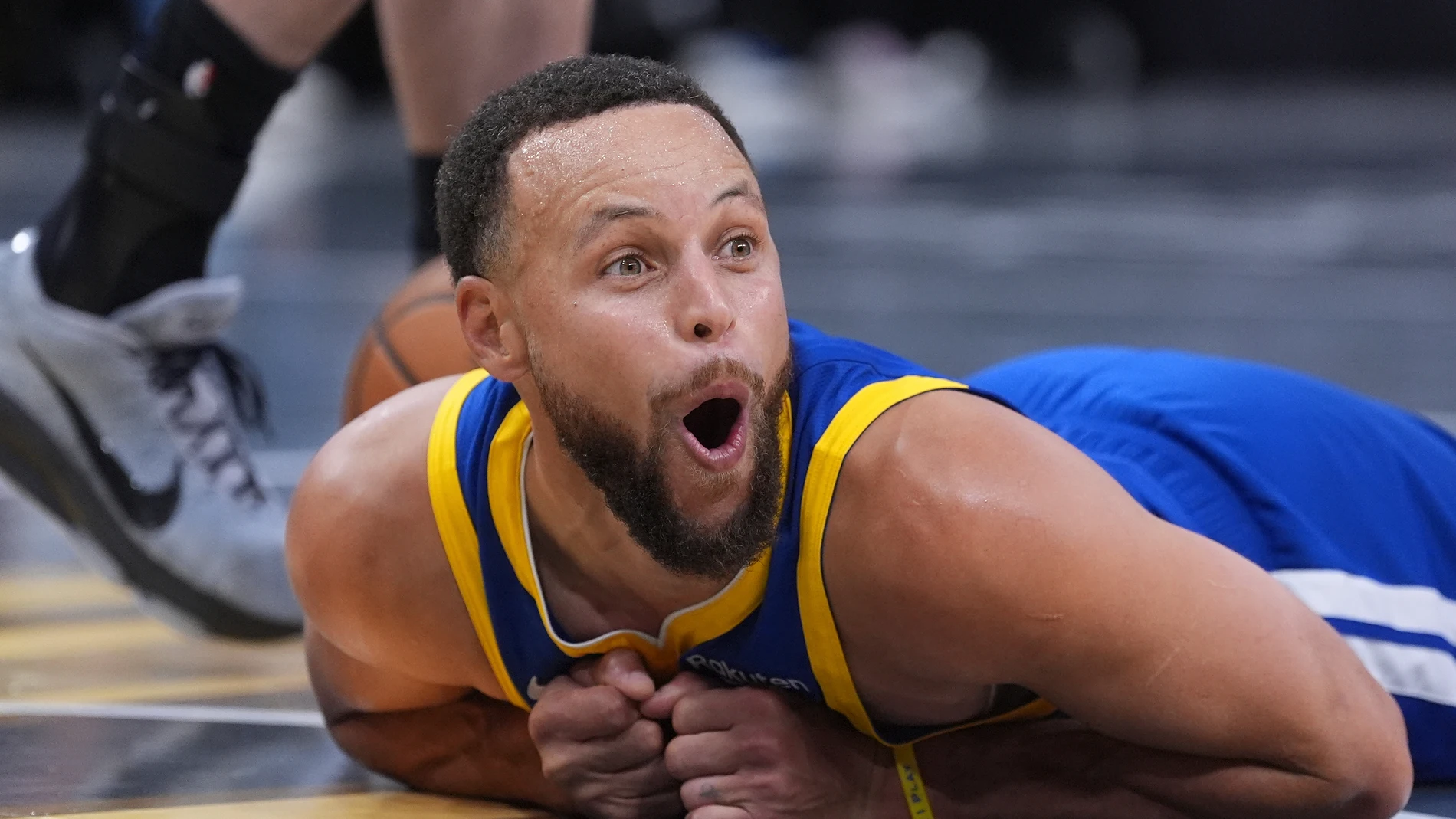 Golden State Warriors guard Stephen Curry (30) reacts after he was fouled during the second half of an NBA Cup basketball game against the San Antonio Spurs in San Antonio, Friday, Nov. 14, 2025. (AP Photo/Eric Gay)