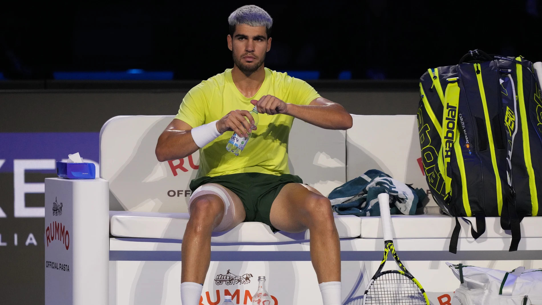 Spain's Carlos Alcaraz sits between the games during the final tennis match of the ATP World Tour Finals against Italy's Jannik Sinner, in Turin, Italy, Sunday, Nov. 16, 2025. (AP Photo/Antonio Calanni)