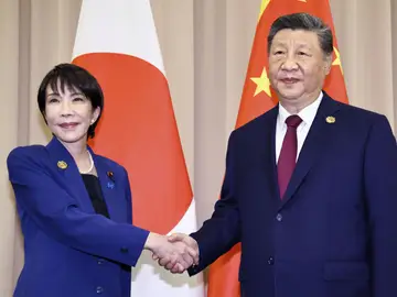 China Japan Explainer FILE - Chinese President Xi Jinping, right, shakes hands with Japanese Prime Minister Sanae Takaichi ahead of their meeting in Gyeongju, South Korea, Oct. 31, 2025. (Kyodo News via AP, File)