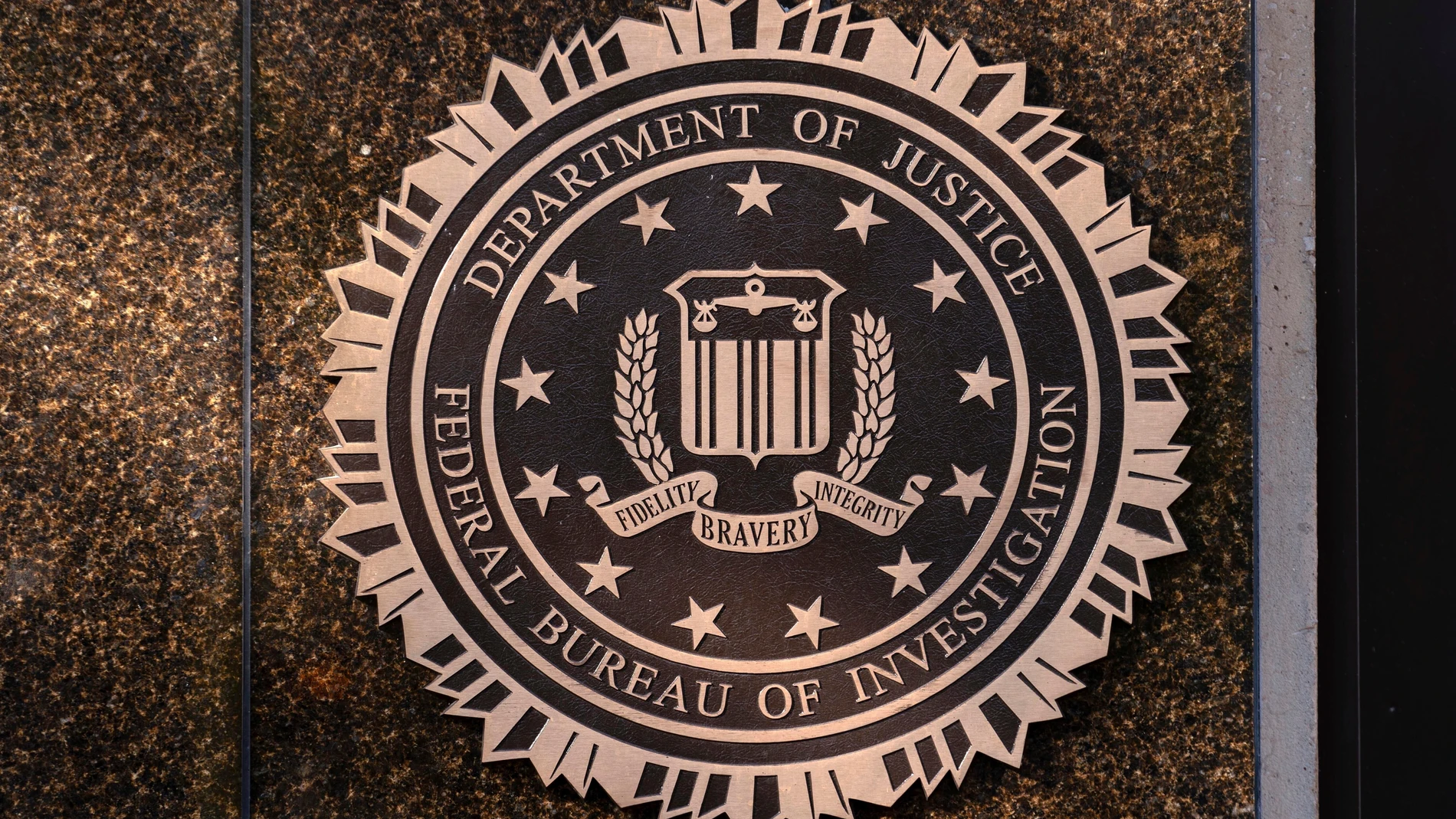 FILE - The seal of the Federal Bureau of Investigation is displayed at its headquarters in Washington, Nov. 18, 2024. (AP Photo/Jose Luis Magana, File)