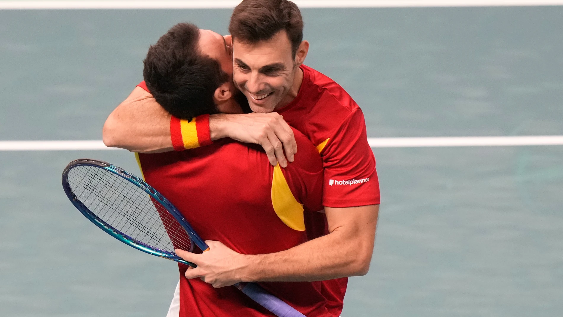 Spain's Marcel Granollers and his teammate Pedro Martinez celebrate as they play against Czech Republic's Tomas Machac and his teammate Jakub Menisk during a Davis Cup quarterfinal double tennis match between Spain and Czech Republic, in Bologna, Italy, Thursday, Nov. 20, 2025. (AP Photo/Luca Bruno)