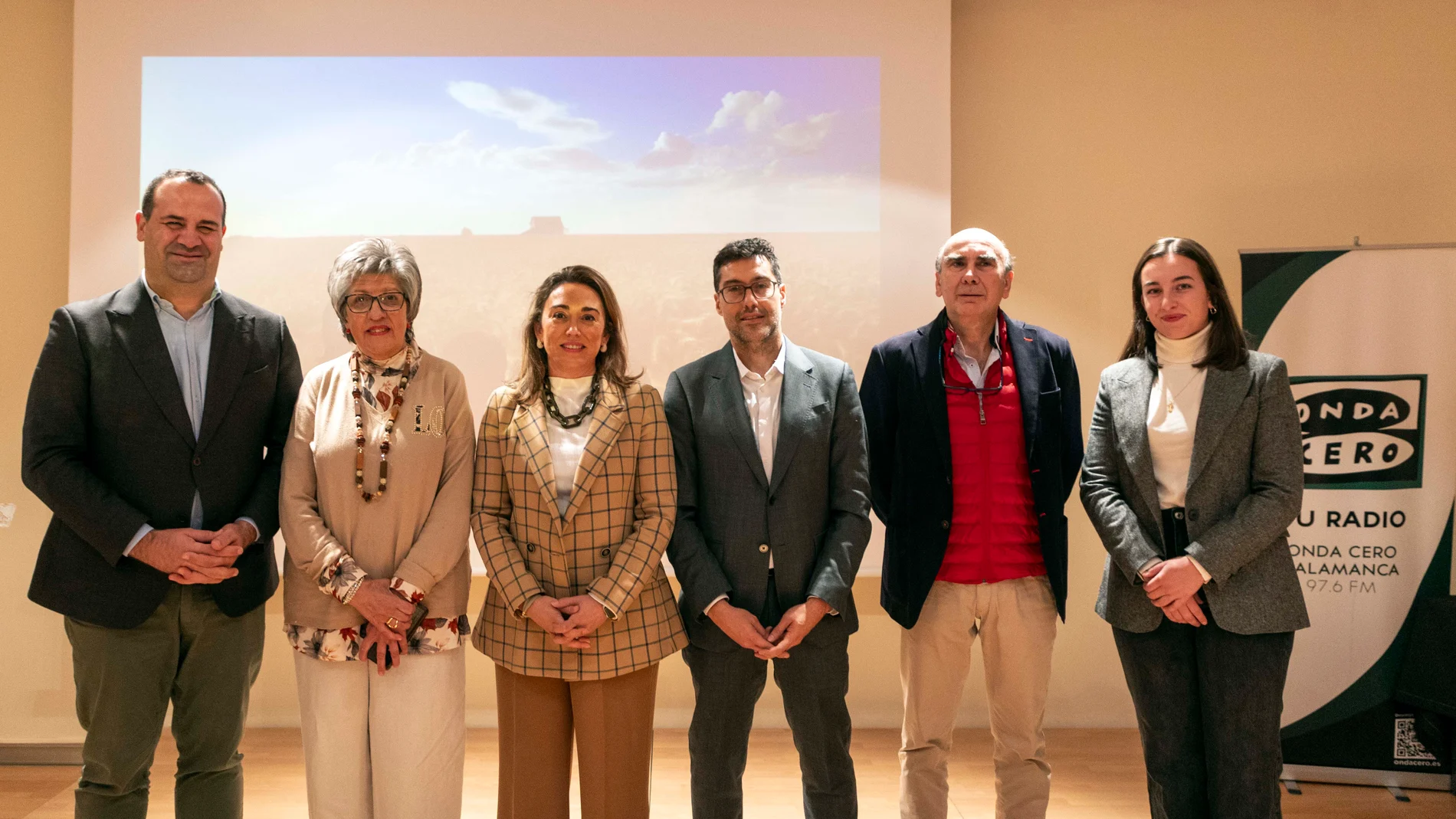 González Corral junto a Roberto Mayado y los premiados