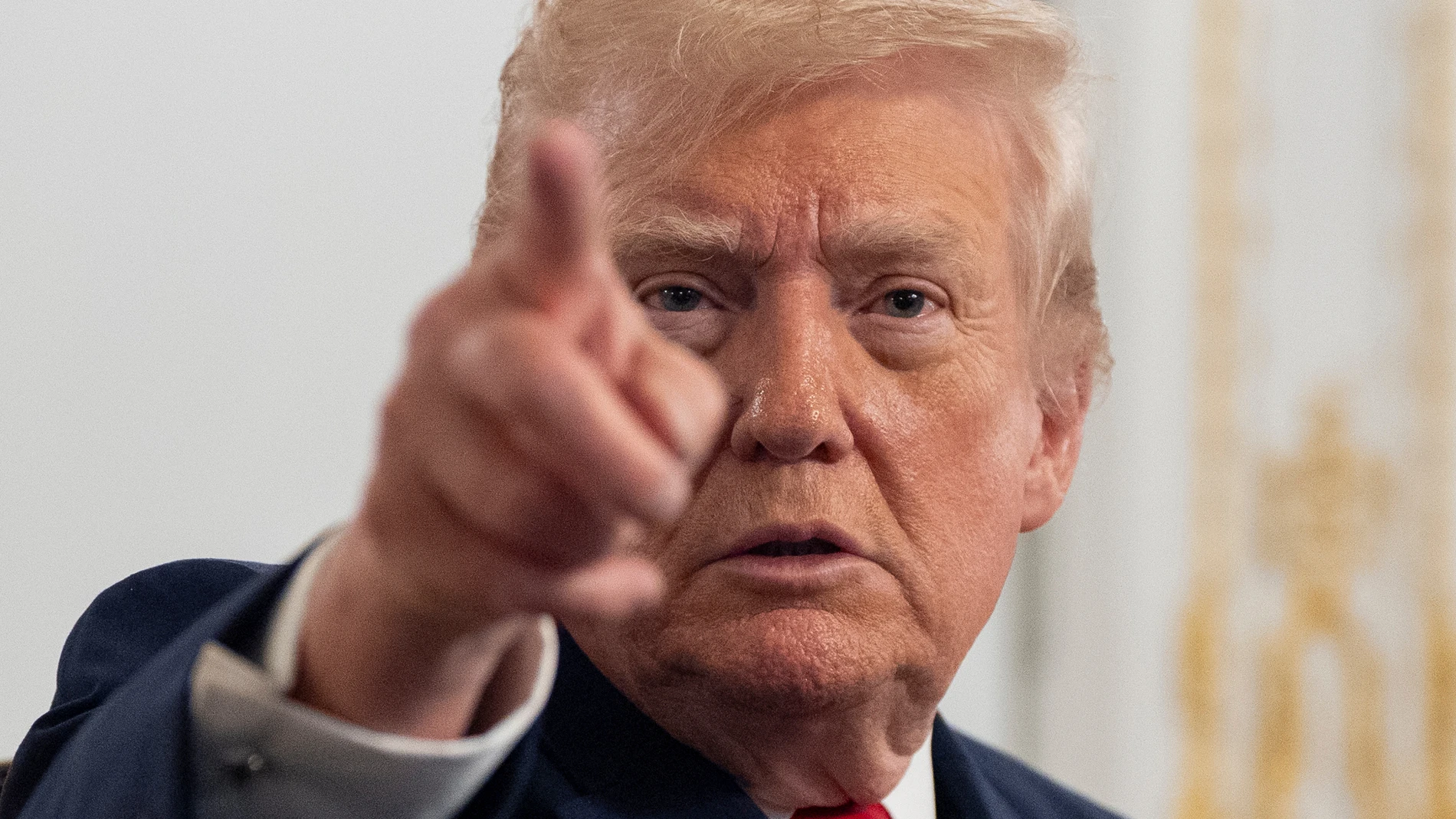 President Donald Trump speaks to reporters after speaking to troops via video from his Mar-a-Lago estate on Thanksgiving, Thursday, Nov. 27, 2025, in Palm Beach, Fla. (AP Photo/Alex Brandon)